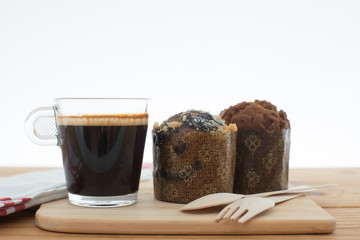 Cup of espresso and muffin bakery.