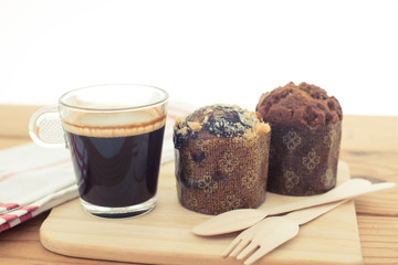 Cup of espresso and muffin bakery.