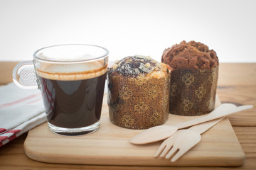 Cup of espresso and muffin bakery.