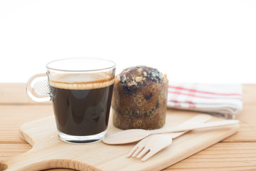 Cup of espresso and muffin bakery.