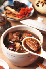 Pork chops in Chinese medicine soup. a popular night market food   