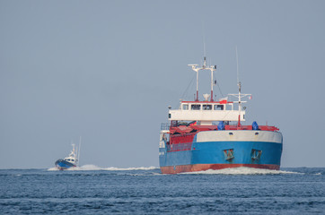 MERCHANT VESSEL - Freighter sailing on the sea