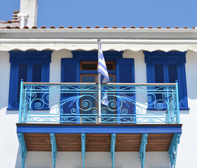 Skiathos Greek Island House Facade with Greek Flag