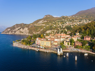 Fototapeta na wymiar Port of Varenna, ferry boat on lake of Como