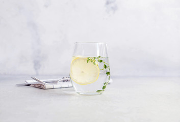 Water with lemon and herbs