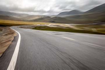 road in grassland,moution blur