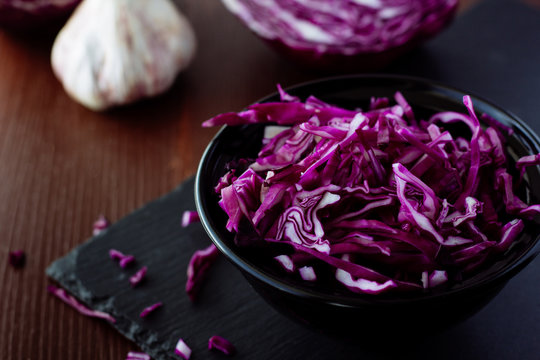Red cabbage salad in black bowl
