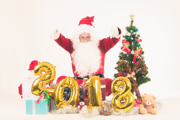 Happy merry Christmas Santa Claus pointing holding Gift Box with Isolated on white background.