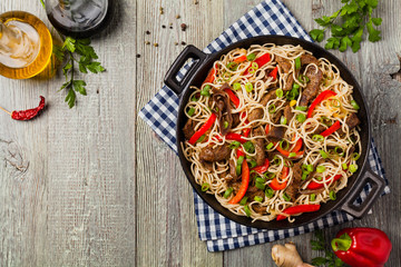 Chinese pasta with beef. Prepared in wok.