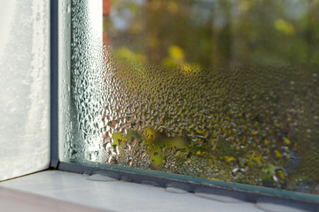 window with water drops closeup, inside, selective focus - obrazy, fototapety, plakaty