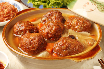 Braised pork balls in soy sauce   - Chinese  pork meatballs stewed with  cabbage.