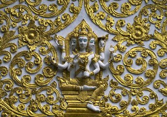 Temple relief detail Chiang Mai Lanna Thailand