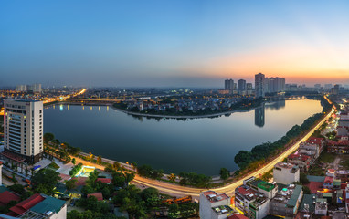 Aerial view of Hanoi skyline cityscape at twilight period. Linh Dam lake, south of Hanoi capital