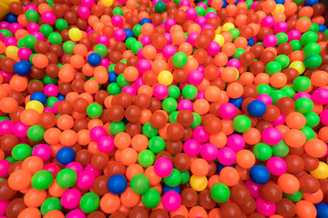 Fototapeta na wymiar Colorful plastic balls in children park
