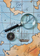 magnifier and compass on  map