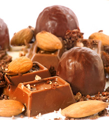 Image of chocolate, and almond nuts close up