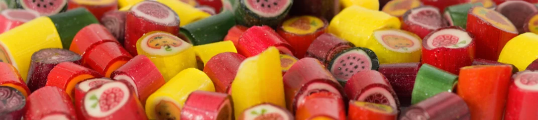 Foto op Plexiglas Snoepjes afbeelding van vele heerlijke snoepjes close-up