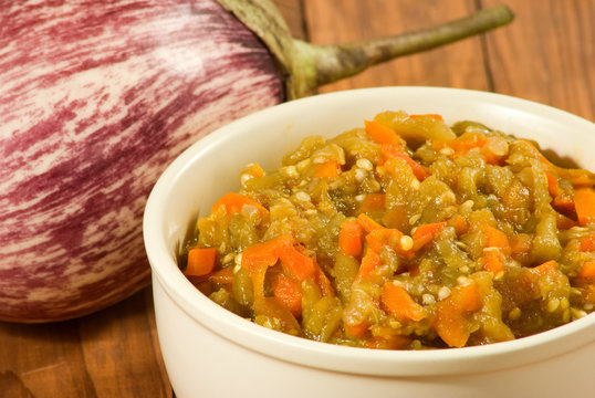 image of ragout and eggplant on table closeup