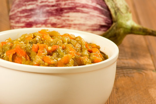 image of ragout and eggplant on table closeup