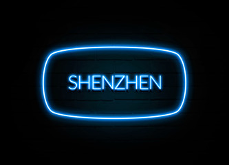 Shenzhen  - colorful Neon Sign on brickwall