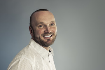 bearded smiling man portrait