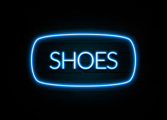 Shoes  - colorful Neon Sign on brickwall
