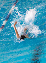 boy on a swim in a sports pool