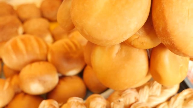 smoked cheese on the counter in the bazaar. 4k.