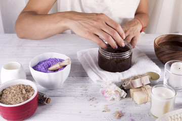 Woman hands receiving a hand scrub peeling