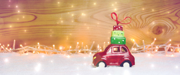 Weihnachten  - Rustikaler Holzhintergrund mit Auto