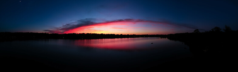 Fototapeta na wymiar Sunset on a lake - 180 Degrees Panorama