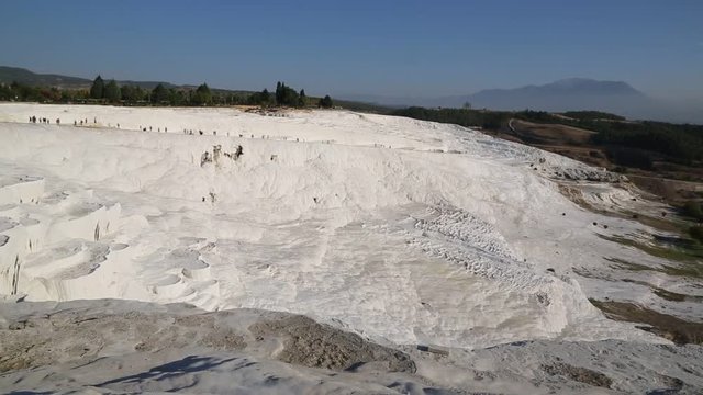 Travertine pools and terraces in Pamukkale, Turkey in a beautiful summer day