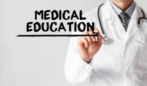Doctor writing word medical education with marker, Medical concept