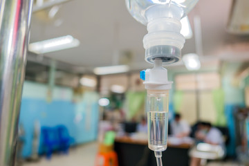 Close up  IV saline solution drip for patient hospital. 