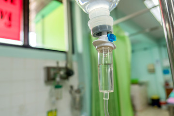 Close up  IV saline solution drip for patient hospital. 