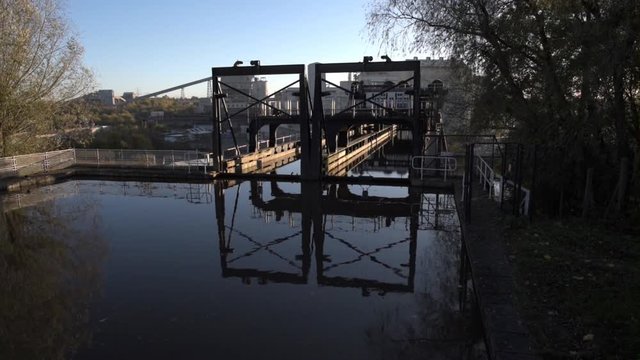 The famous Anderton boat lift that connects the River Weaver and the Trent and Mersey Canal with industrial plant in the background.