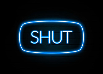Shut  - colorful Neon Sign on brickwall