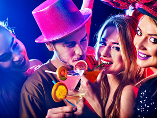 Cocktail party for couple in love disco dancing and drink . Happy women in evening dresses and men...