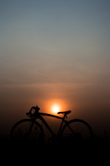 Obraz na płótnie Canvas Silhouette a bicycle