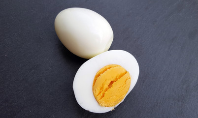 Boiled eggs on dark background close up