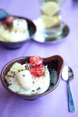 Ice cream  with banana and strawberry in a bowl