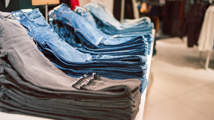 Jeans on the counter of the store