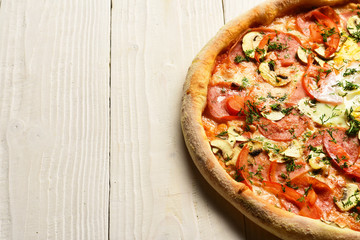 Take away food with red sauce and crunchy edges