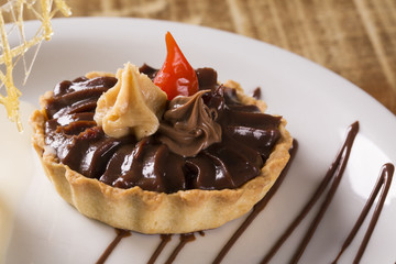 Little pie with ice cream.