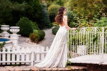 Fototapeta premium Beautiful girl in amazing dress outdoor