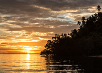 Fototapeta na wymiar Stunning sunset in the Togian islands in Sulawesi