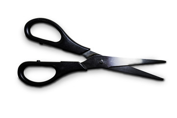Sharp scissors with shiny blades and black handles
