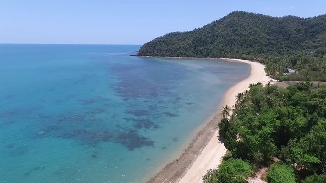 aerial drone flying over the beautiful dunk island in Australia paradise 4k