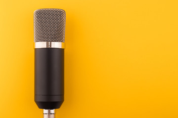 Microphone on a yellow background