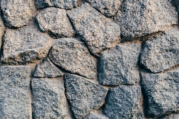 Wall of gray large stone